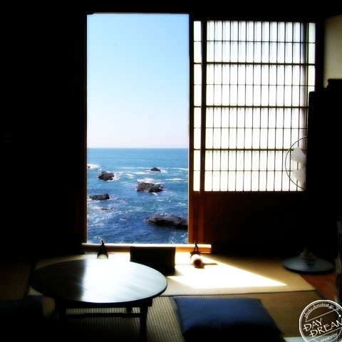 Out of the door is a sea horizon