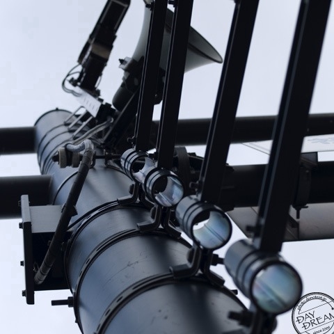 Looks up at the pillar